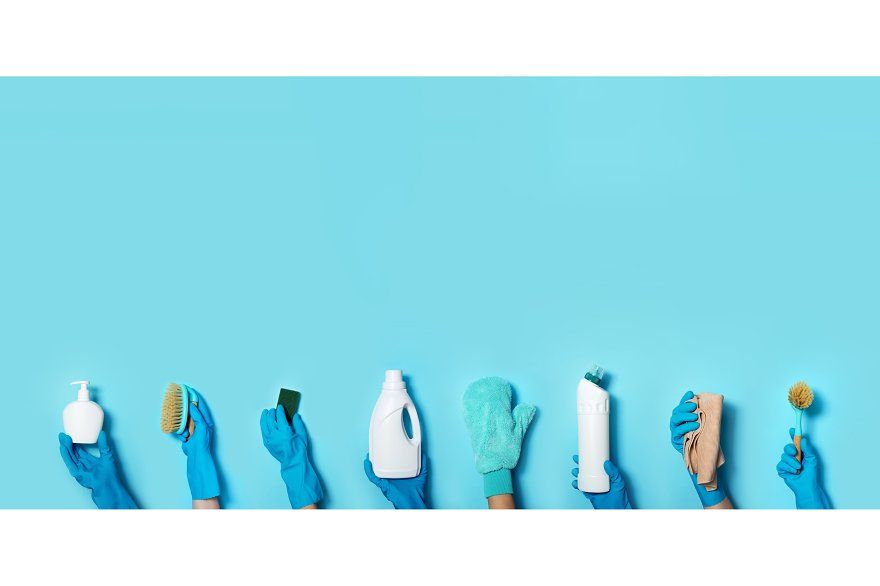 Cleaning products on blue background