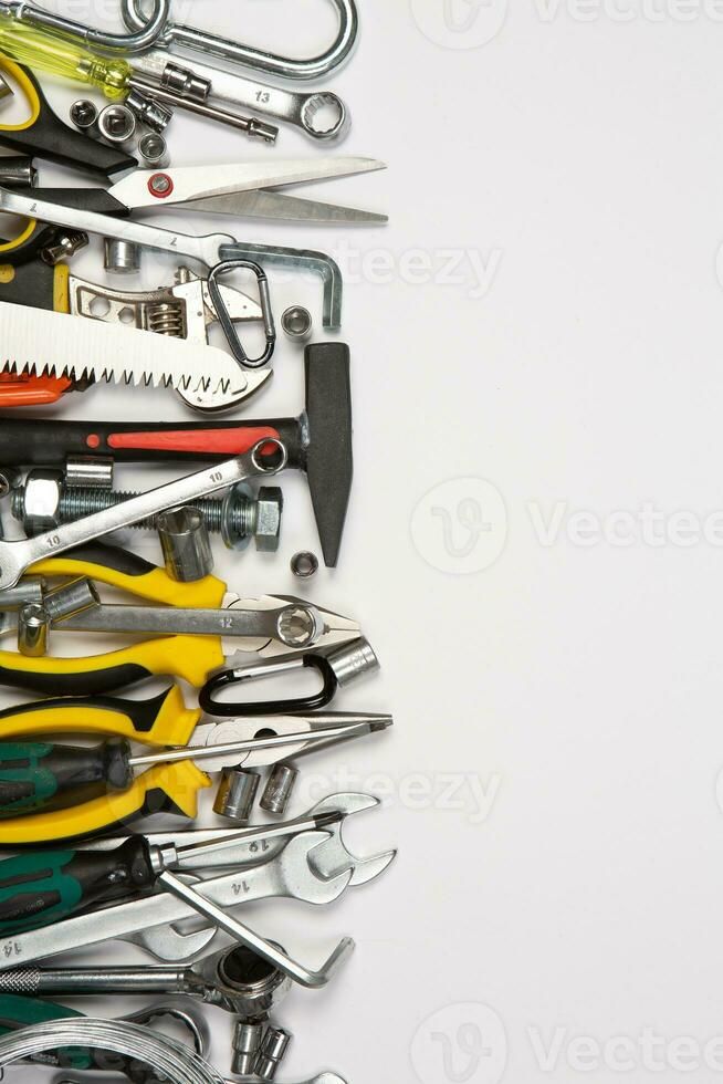 Set of tools for repair in a case on a white background. Assorted work or construction tools. Wrenches, Pliers, screwdriver. Top view