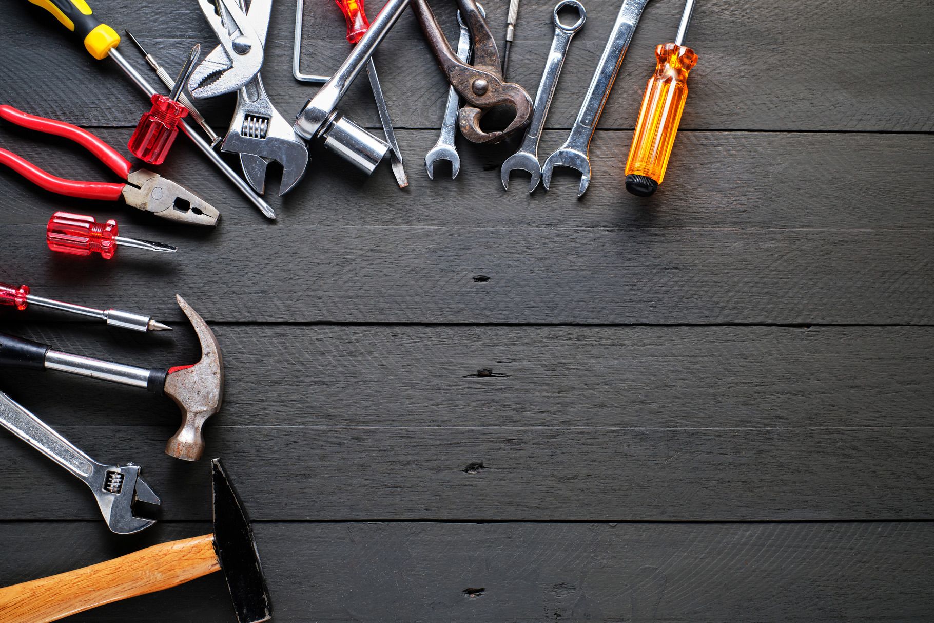 Working tools on black wooden backgr stock photo containing tool and repair, an Industrial Photo by alfernec