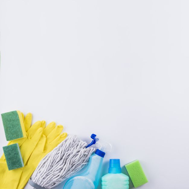 High angle view of cleaning products on grey background | Free Photo