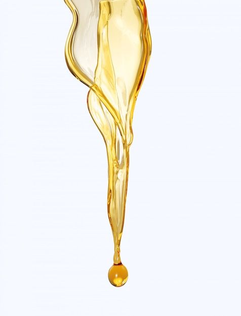 Olive or engine oil splash isolated on white background | Premium Photo